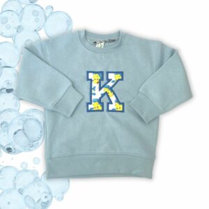 Sudadera celeste con inicial flounder