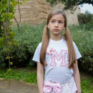Conjunto camiseta con inicial y braga con volantes estampado floral rosa