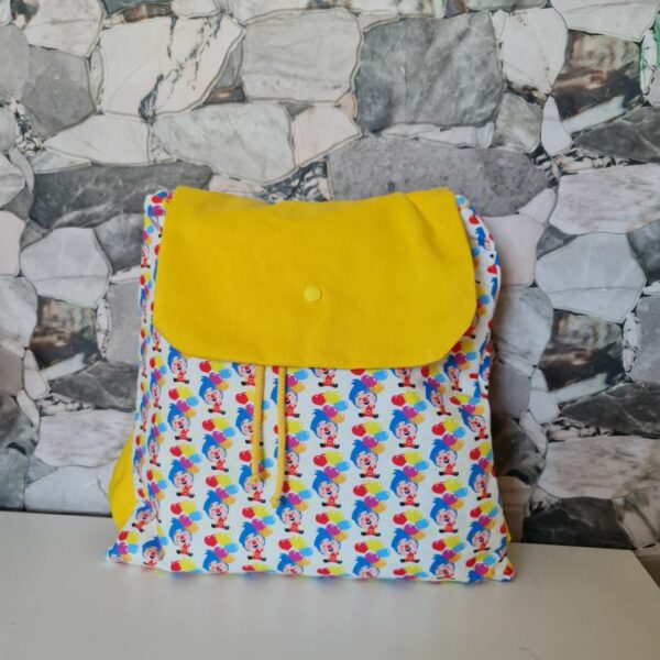 Mochila con solapa amarillo payaso plim plim