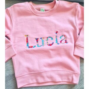 Sudadera rosa con bordado de flores
