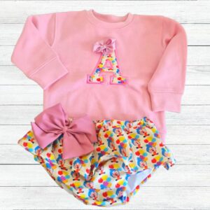 Conjunto sudadera y cubrefalda con inicial del payaso plim plim
