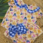 Conjunto de camisa marga corta y cubrepañal con volantes the winnie the pooh