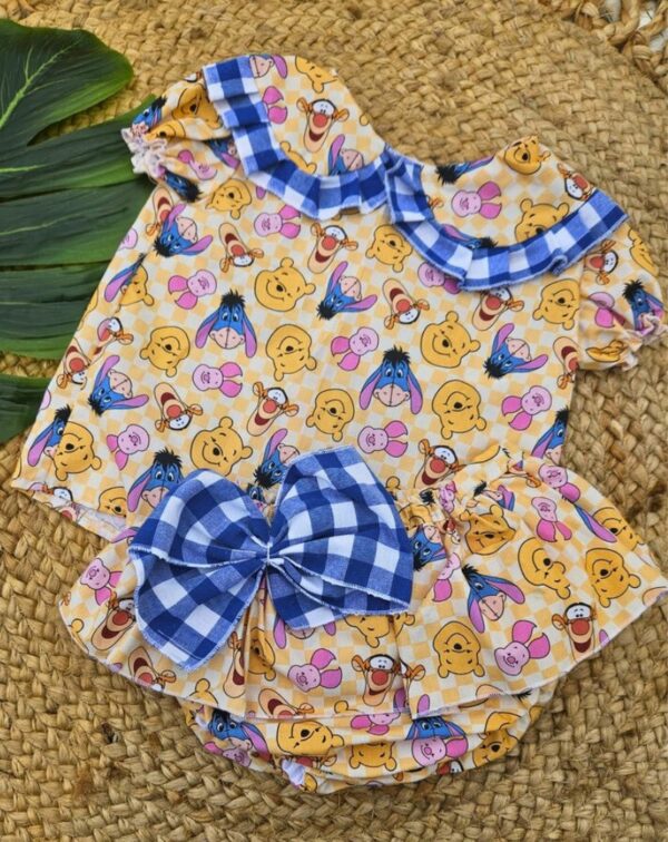 Conjunto de camisa marga corta y cubrepañal con volantes the winnie the pooh