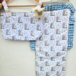 Colchoneta de silla de paseo con bolso panera diseño elefante y patito