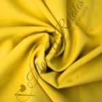 Tela Stretch por metro color amarillo - Telas y Retales