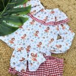 Conjunto de camisa marga larga y cubrepañal con volantes hada