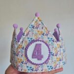 Corona de cumpleaños flores malvas