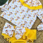 Conjunto de camisa marga larga y cubrepañal con volantes jirafa